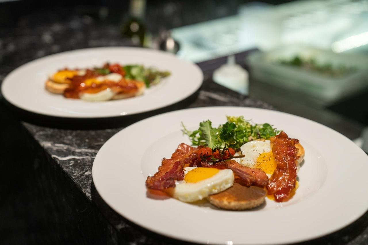 Boscolo Lyon Hotel & Spa Exterior photo A plate of bacon and eggs